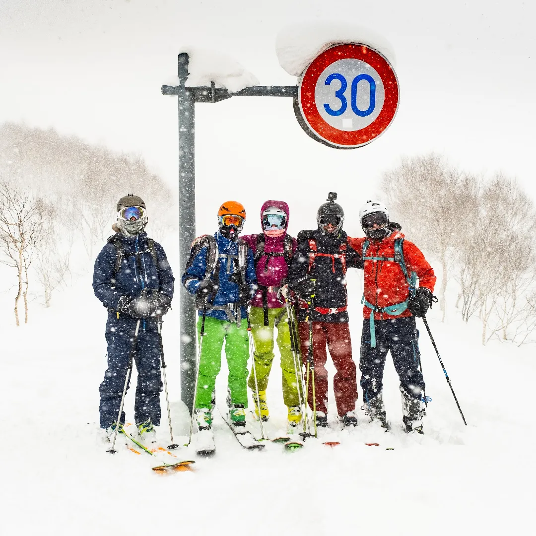Group of skiers in Niseko backcountry